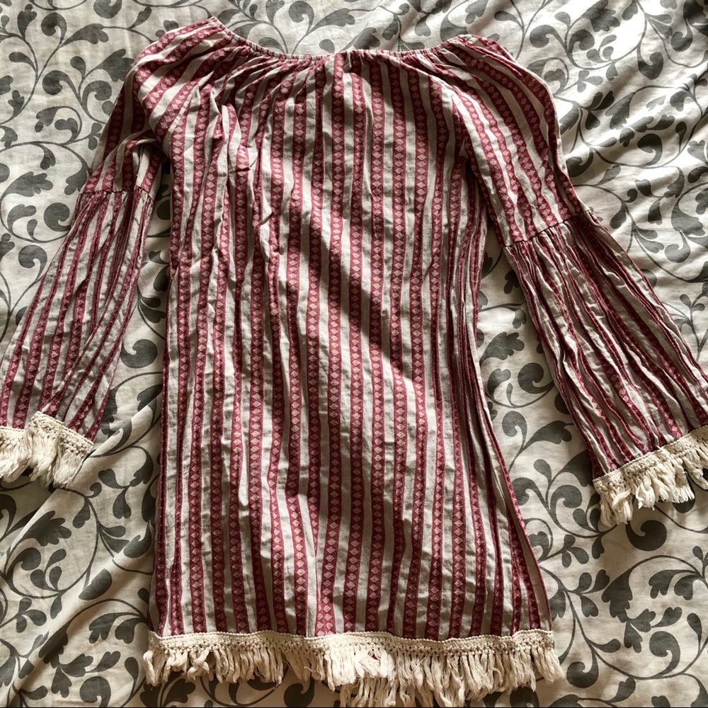 Boho dress with fringe and trumpet sleeves